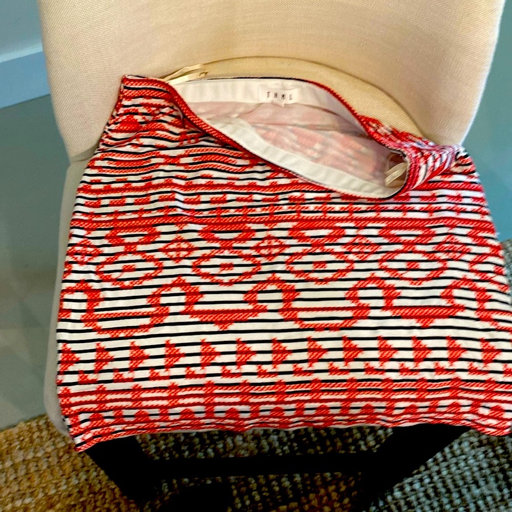 Really cute white with black stripes mini skirt with stitched red X’s - Picture 2 of 5